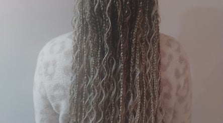 Detailed view of stylish braids at Isl Hair Care in Lawrence, Kansas, US.