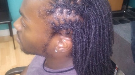 Expertly styled dreadlocks at Isl Hair Care, Lawrence, Kansas, US, showcasing professional hair artistry.
