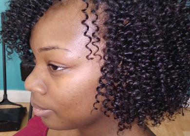 Close-up of styled curly hair at Isl Hair Care, Lawrence, Kansas, US.
