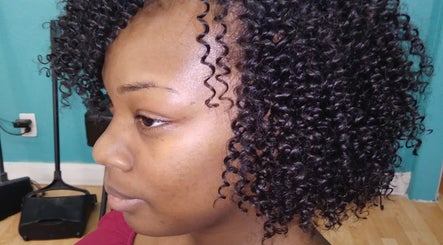 Close-up of styled curls at ISL Hair Care, Lawrence, Kansas, US, showcasing beauty and texture.