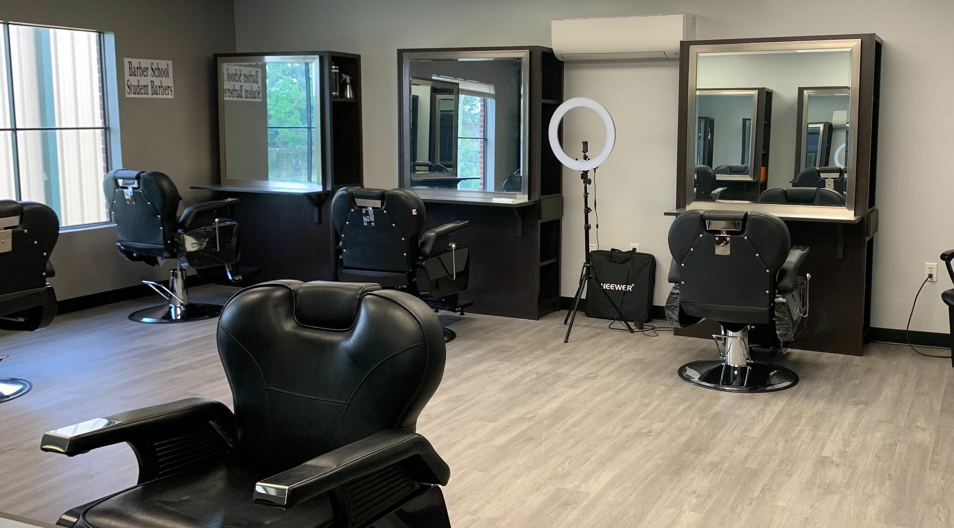 Elegant salon chairs and mirrors at Ridica Cosmetology, Humble, Texas, US, offering a modern beauty experience.
