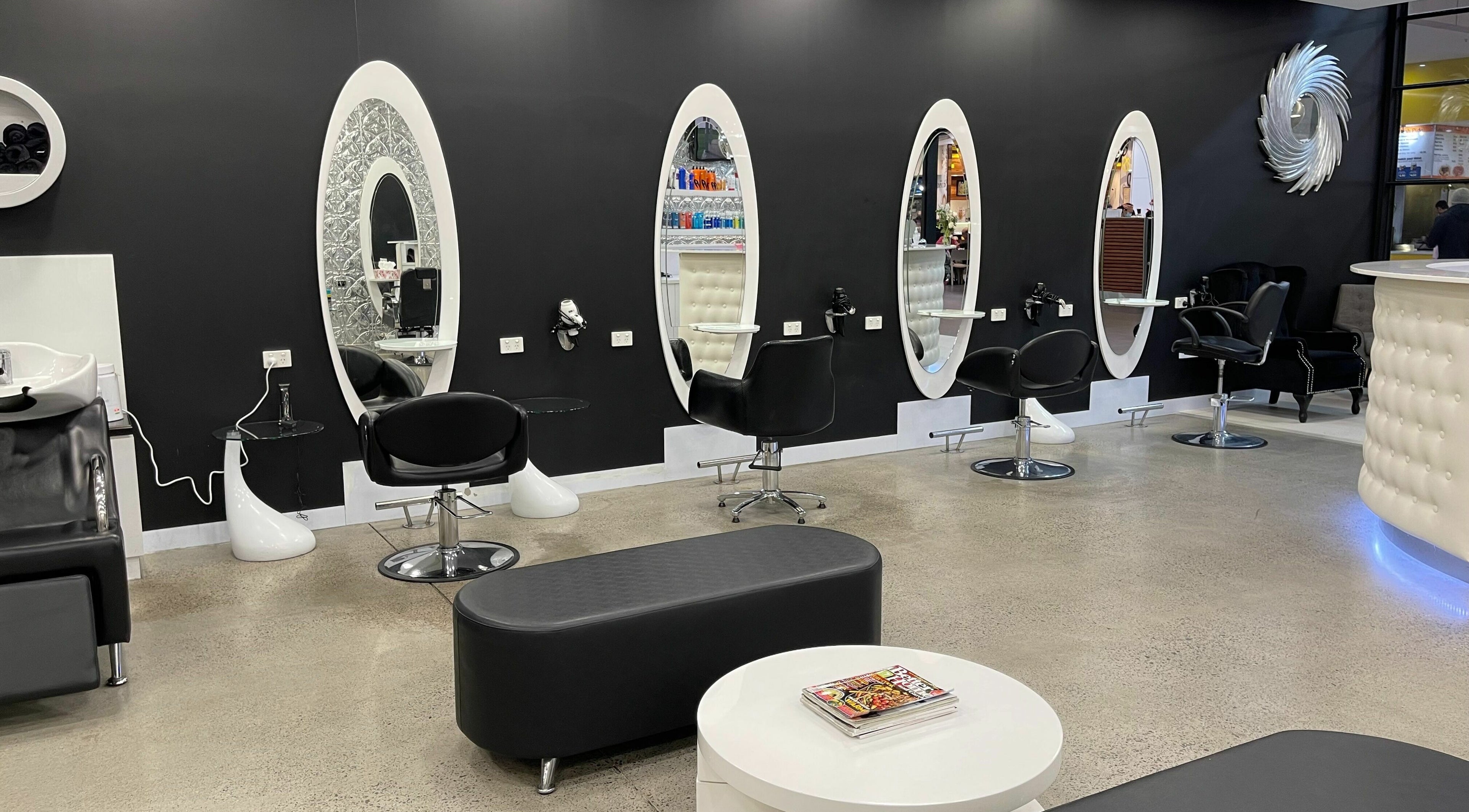 Elegant salon chairs and mirrors at Dazzling Hair and Beauty Churchill Centre, Kilburn, South Australia, AU.