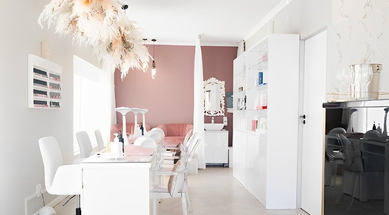 Chic beauty salon interior at Femme Aesthetics in Pretoria, Gauteng, ZA, featuring modern decor and serene atmosphere.