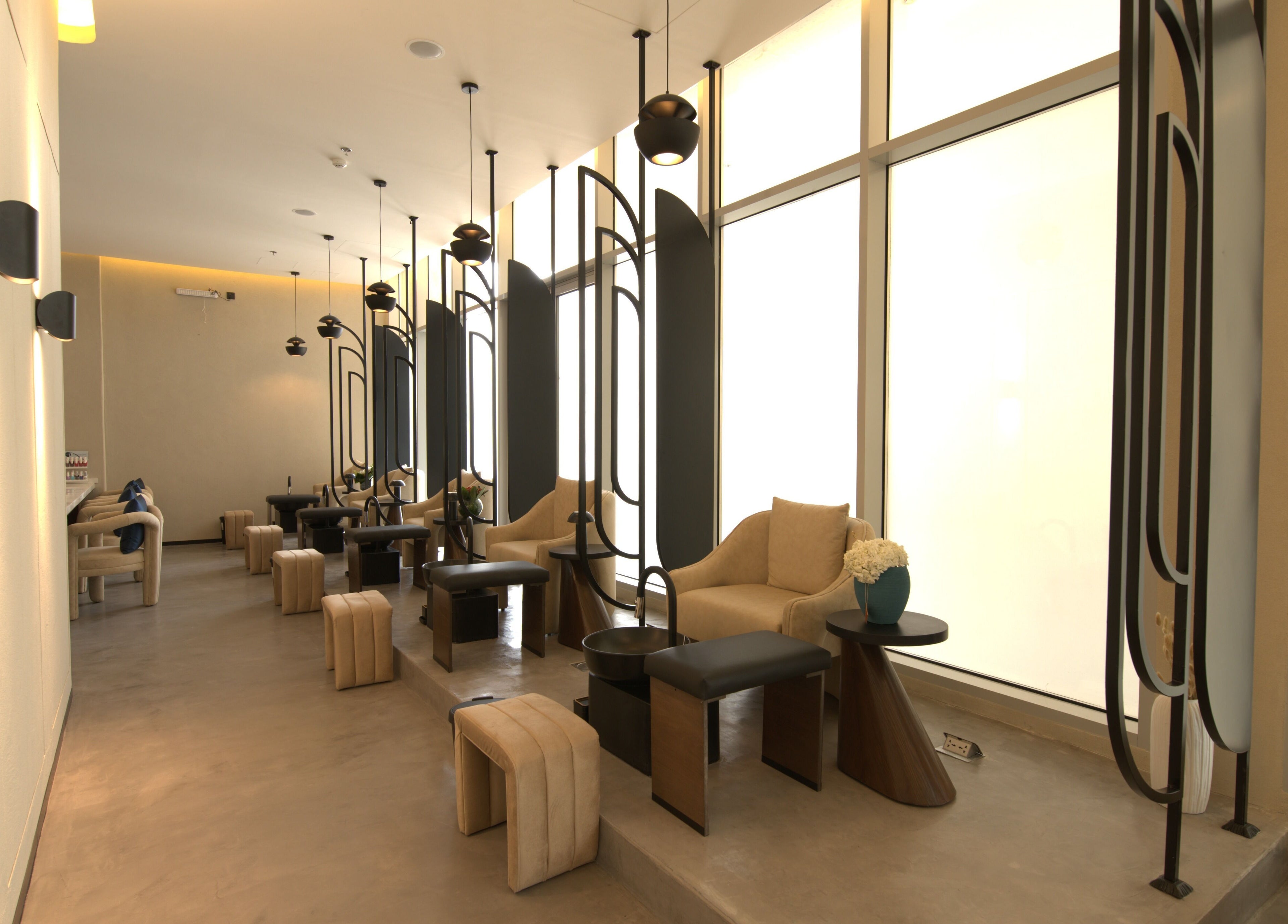 Modern seating area at Lolia Salon and Spa in Riyadh, Riyadh Province, SA with stylish decor.