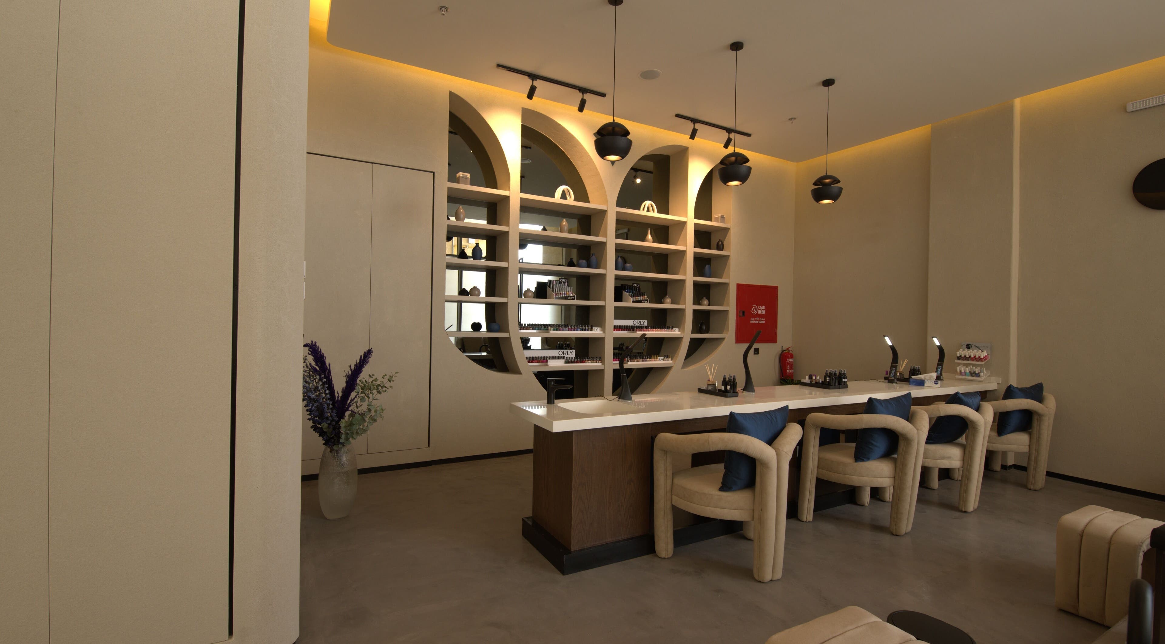 Elegant salon lounge at Lolia Salon and Spa, Riyadh, Riyadh Province, SA with stylish decor and nail care stations.