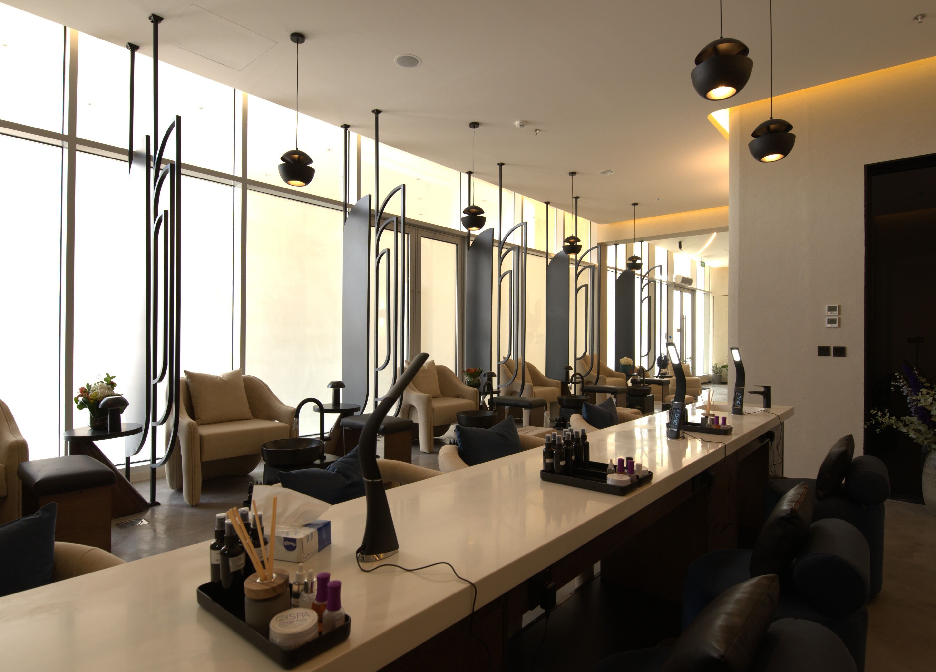 Modern interior of Lolia Salon and Spa in Riyadh, Riyadh Province, SA, featuring plush seating and sleek decor.