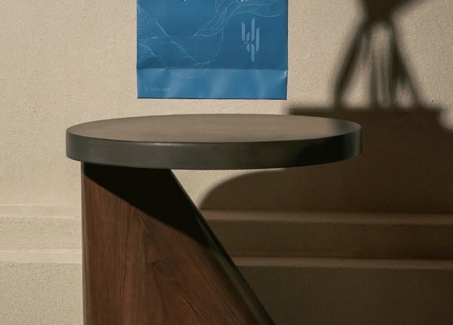 Modern wooden side table at Lolia Salon and Spa, Riyadh, Riyadh Province, SA. Perfect for a serene atmosphere.