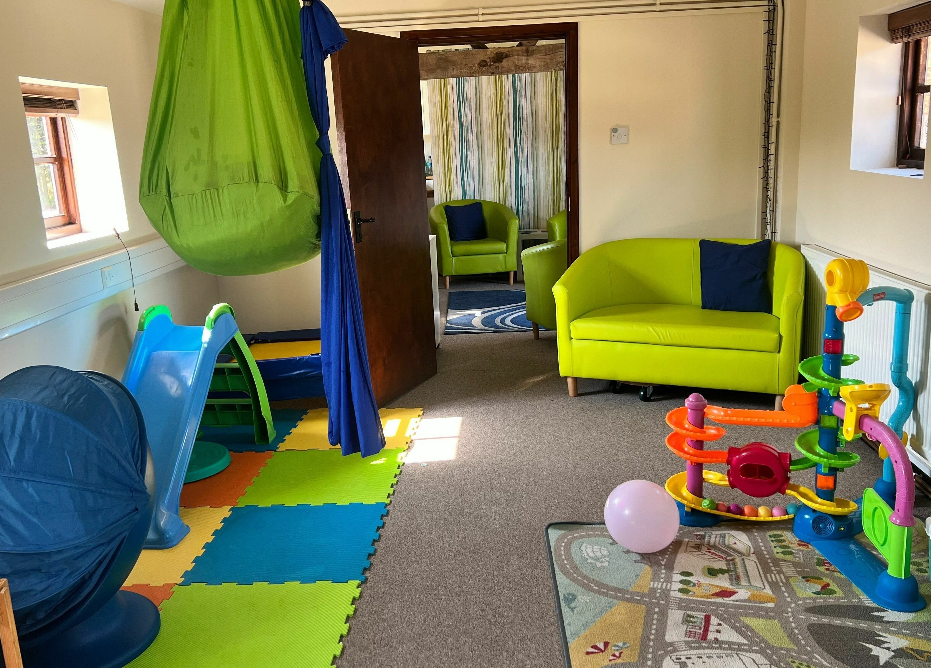 Colorful therapy room with toys at Small Talk Speech and Language Therapy, Derby, England, GB.