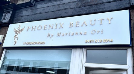 Phoenix Beauty By Marianna Ori storefront sign at Wirral, England, GB, showcasing elegant lettering.