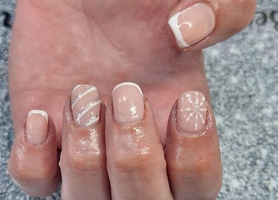 Stylish snowflake nail art at Phoenix Beauty By Marianna Ori, Wirral, England, GB.