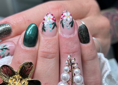 Floral nail art at Phoenix Beauty By Marianna Ori in Wirral, England, GB, featuring elegant pastel designs.