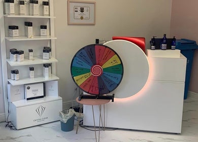 Dream Therapy's skincare display and prize wheel in Sunderland, England, GB, highlighting beauty products.