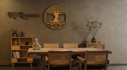 Inviting table setup at Nirama Healing Therapies Centre, Adeje, Canarias, ES, featuring natural decor elements.