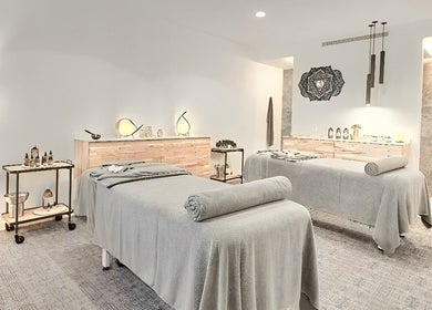 Relaxing massage room at Nirama Healing Therapies Centre in Adeje, Canarias, ES with two treatment tables.