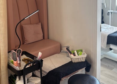 Cozy nail station at NK Nail & Beauty Bar, Moate, County Westmeath, IE, showing tools and vibrant decor.