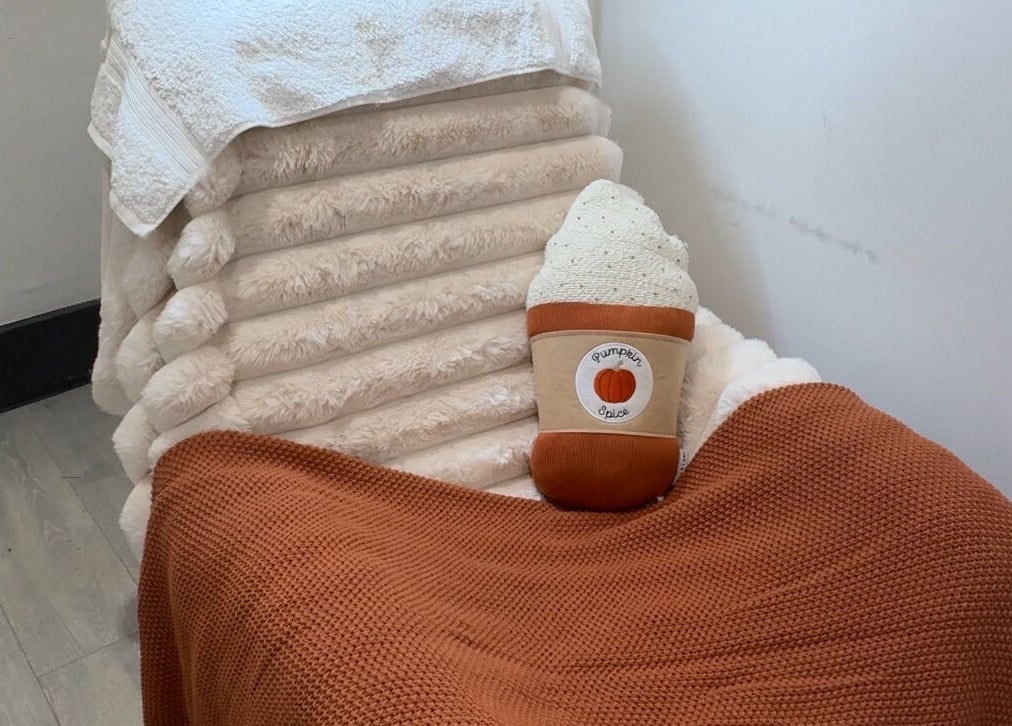 Comfortable seating with plush towel stack at Beauty By Jordan Jaye - BEDDAU in Beddau, Wales, GB.