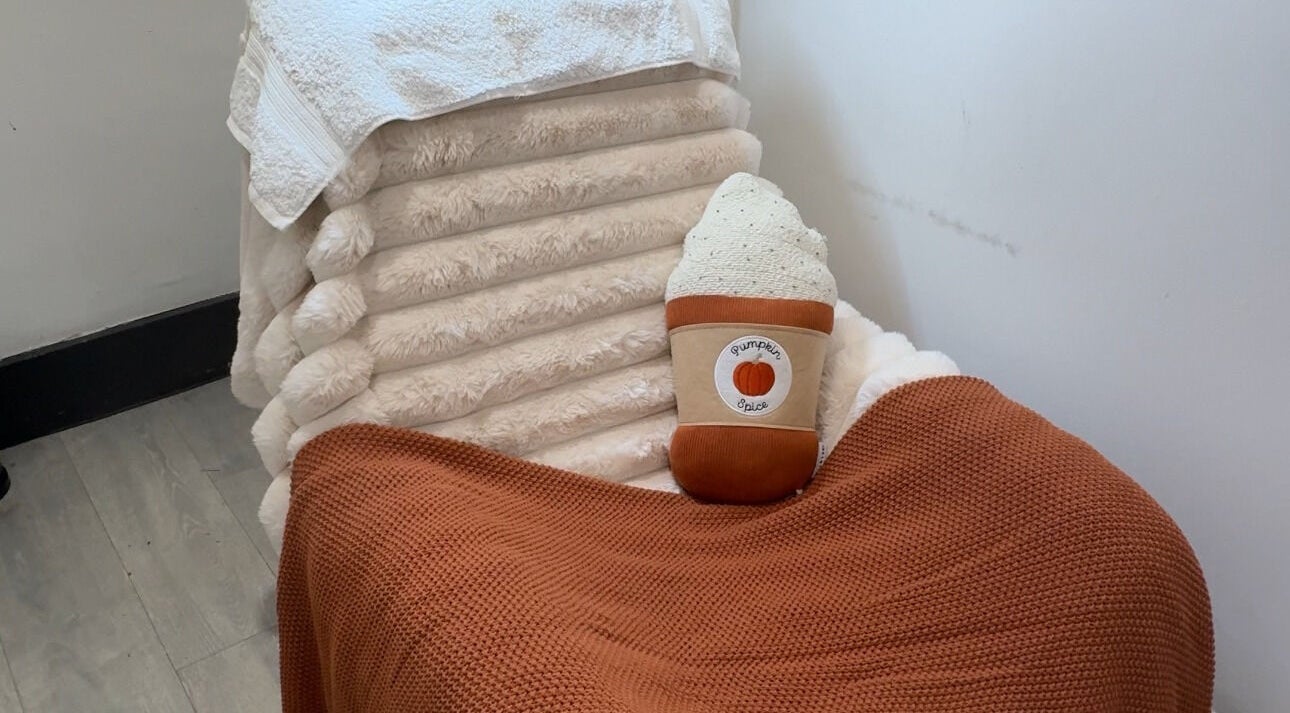 Comfortable seating with plush towel stack at Beauty By Jordan Jaye - BEDDAU in Beddau, Wales, GB.