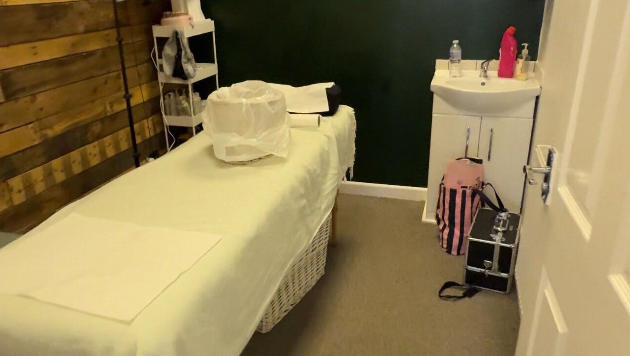 Tranquil treatment room at Beauty by Jordan Jaye - Denbigh, Denbigh, Wales, GB, featuring a massage bed and sink.