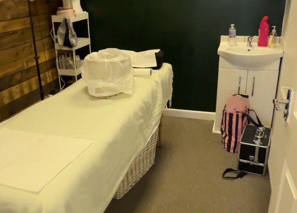 Tranquil treatment room at Beauty by Jordan Jaye - Denbigh, Denbigh, Wales, GB, featuring a massage bed and sink.