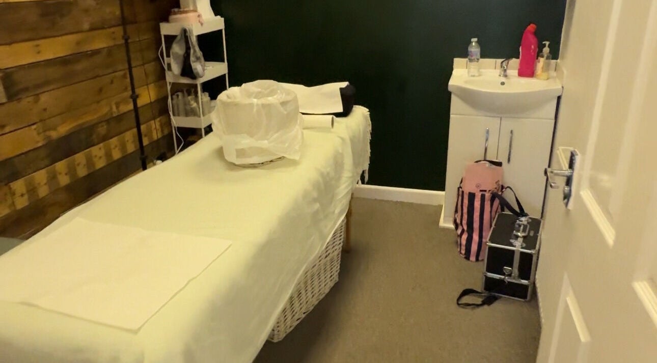 Tranquil treatment room at Beauty by Jordan Jaye - Denbigh, Denbigh, Wales, GB, featuring a massage bed and sink.