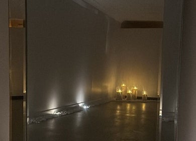 Tranquil candlelit room at Glow Szn in Condell Park, New South Wales, AU, creating a soothing ambiance.