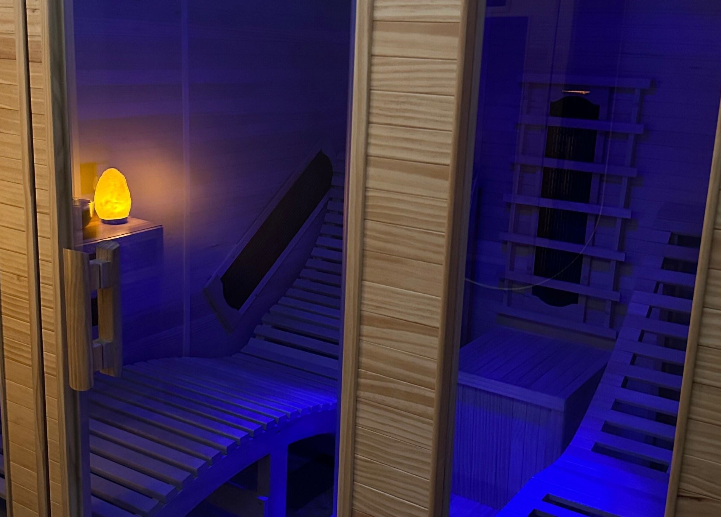 Relaxing sauna with soft lighting at Glow Szn, Condell Park, New South Wales, AU.