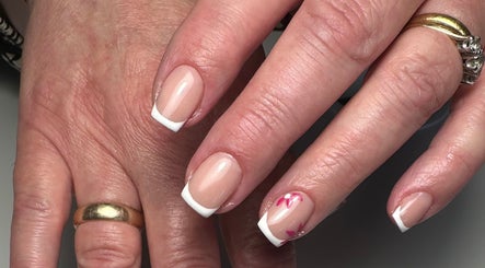 French manicure with floral design at A Touch of Colour, Eastleigh, England, GB.