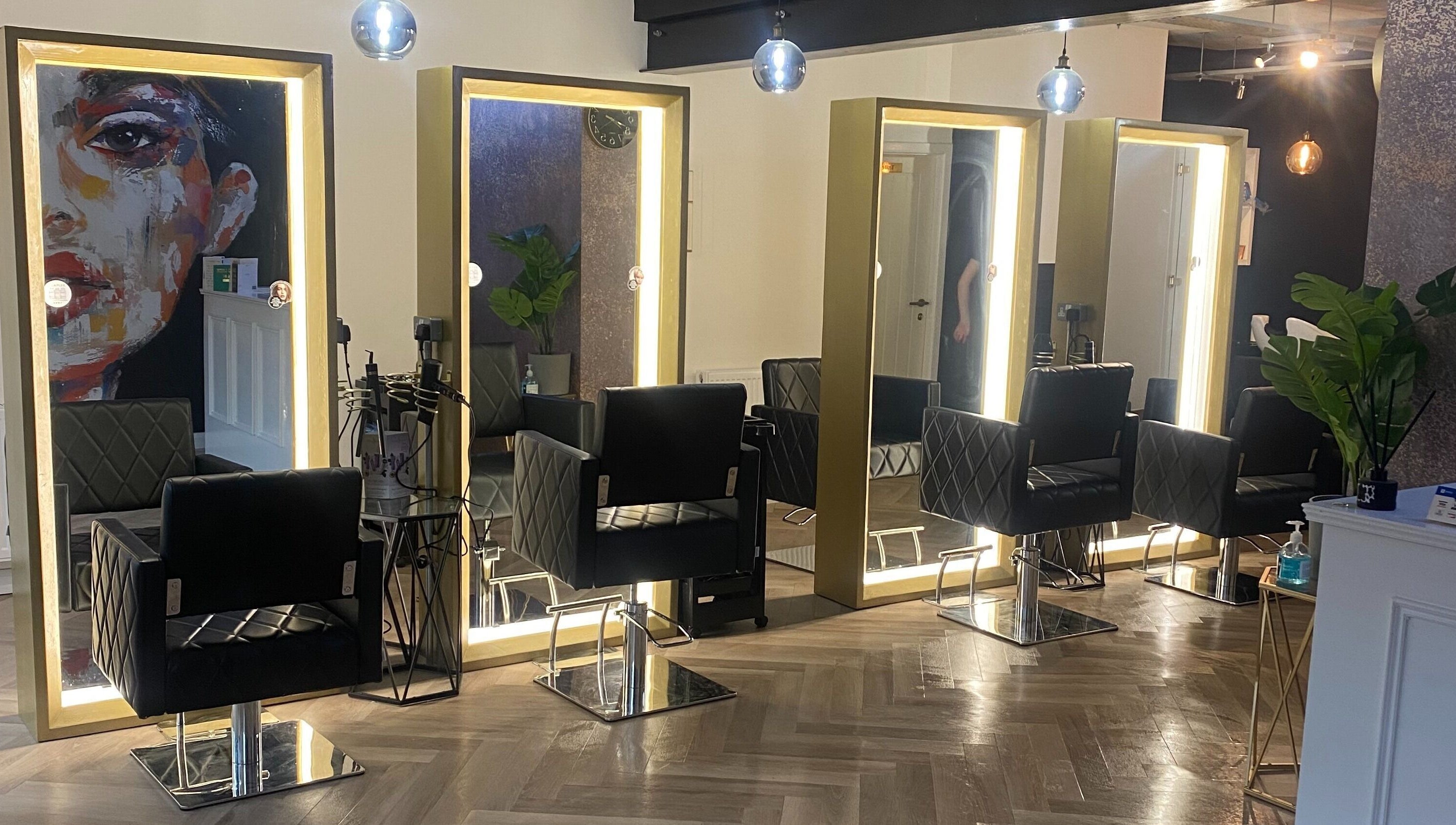 Luxurious hair salon chairs at E.L.M Academy, Bacup, England, GB offer a stylish beauty experience.