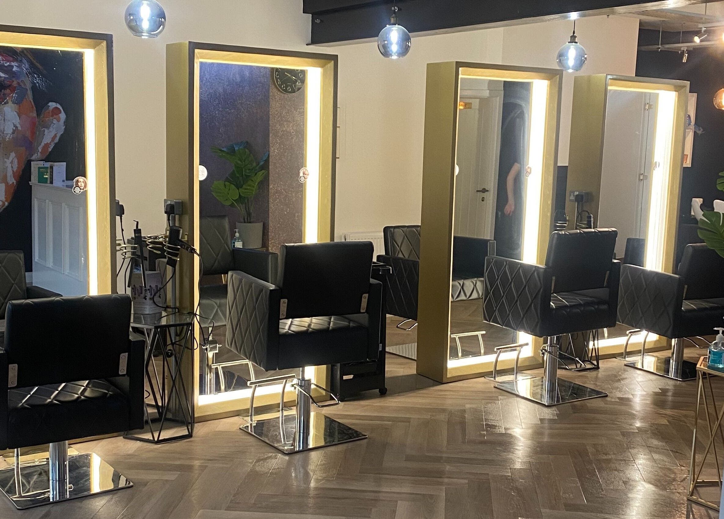 Luxurious hair salon chairs at E.L.M Academy, Bacup, England, GB offer a stylish beauty experience.
