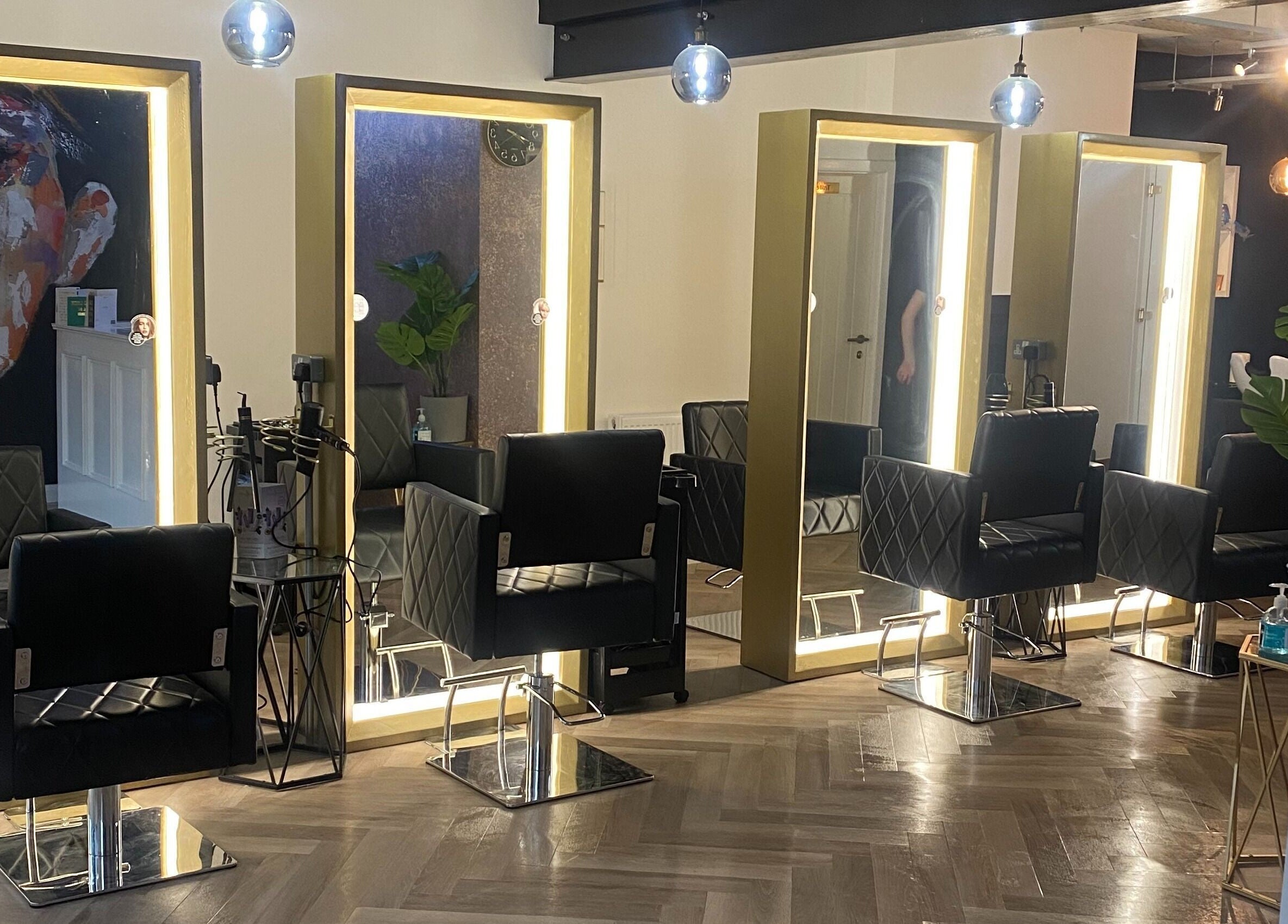 Luxurious hair salon chairs at E.L.M Academy, Bacup, England, GB offer a stylish beauty experience.