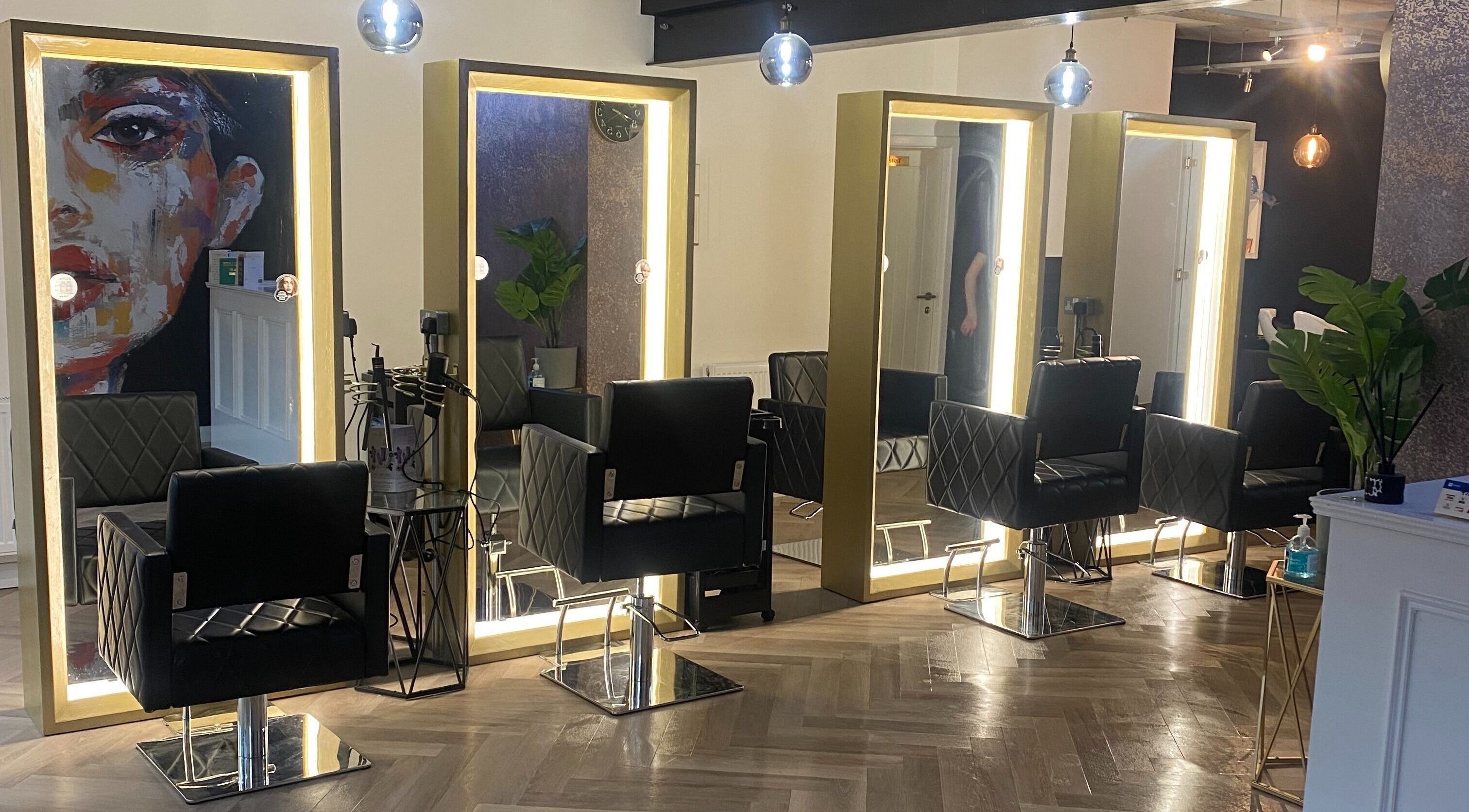 Luxurious hair salon chairs at E.L.M Academy, Bacup, England, GB offer a stylish beauty experience.