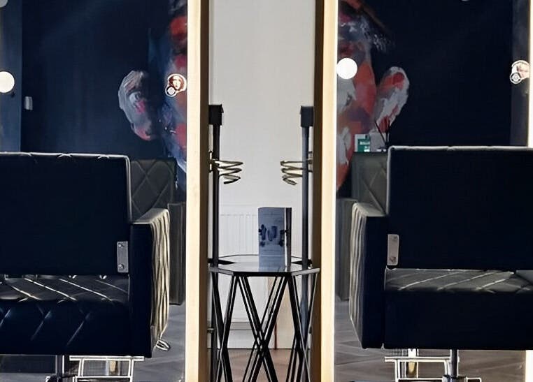 Elegant salon chairs and mirrors at E.L.M Academy, Bacup, England, GB.