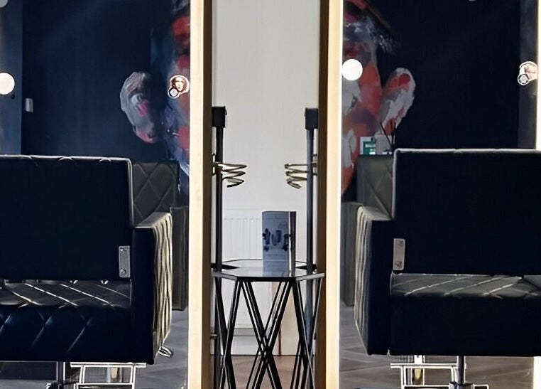 Elegant salon chairs and mirrors at E.L.M Academy, Bacup, England, GB.