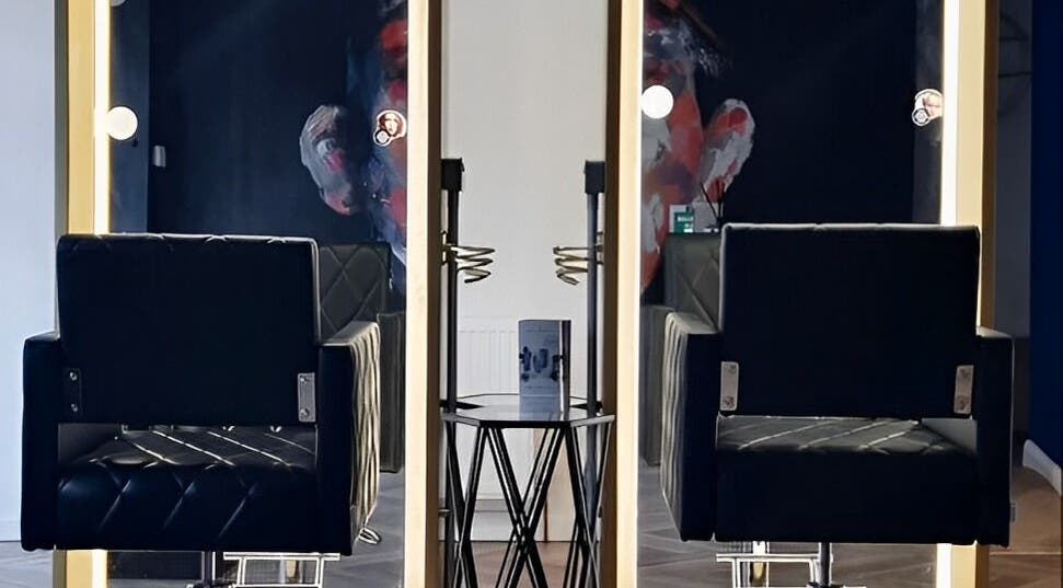 Elegant salon chairs and mirrors at E.L.M Academy, Bacup, England, GB.
