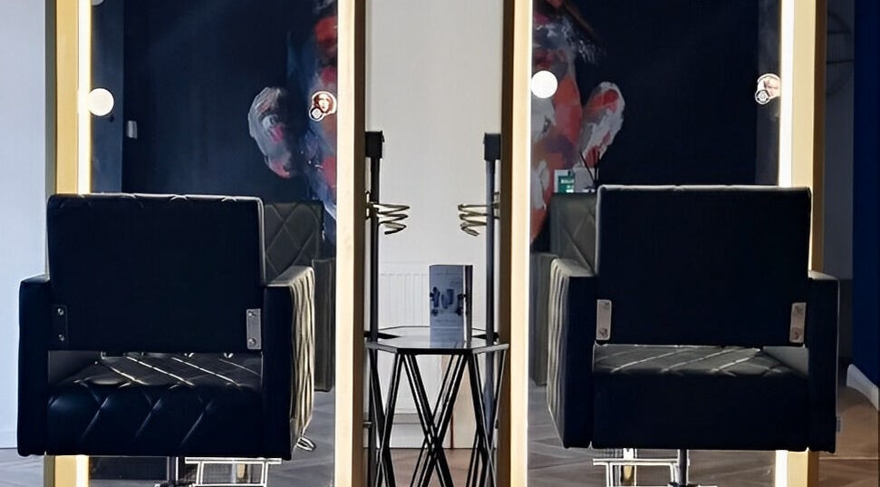 Elegant salon chairs and mirrors at E.L.M Academy, Bacup, England, GB.