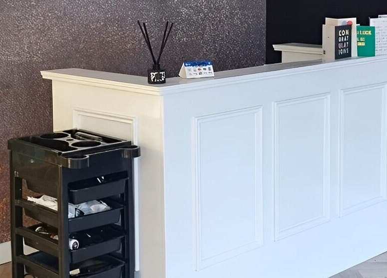 Reception desk at E.L.M Academy, Bacup, England, GB with stylish decor and modern design.