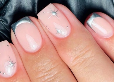 Elegant nail art with silver stars at Beauty by Kellie, Holmewood, England, GB.