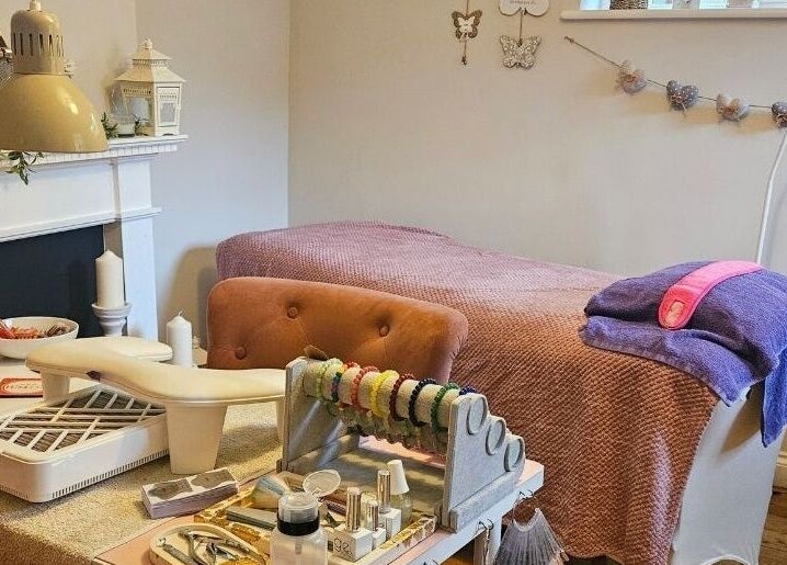 Cozy treatment room at Radiant Rose Beauty Room in Salisbury, England, GB. Inviting atmosphere with beauty tools.