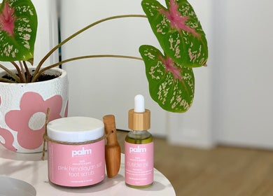 Palm Beauty Noosa self-care products and vibrant plant at Noosaville, Queensland, AU.