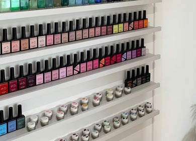 Colorful nail polish display at Palm Beauty Noosa in Noosaville, Queensland, AU enhancing decor.
