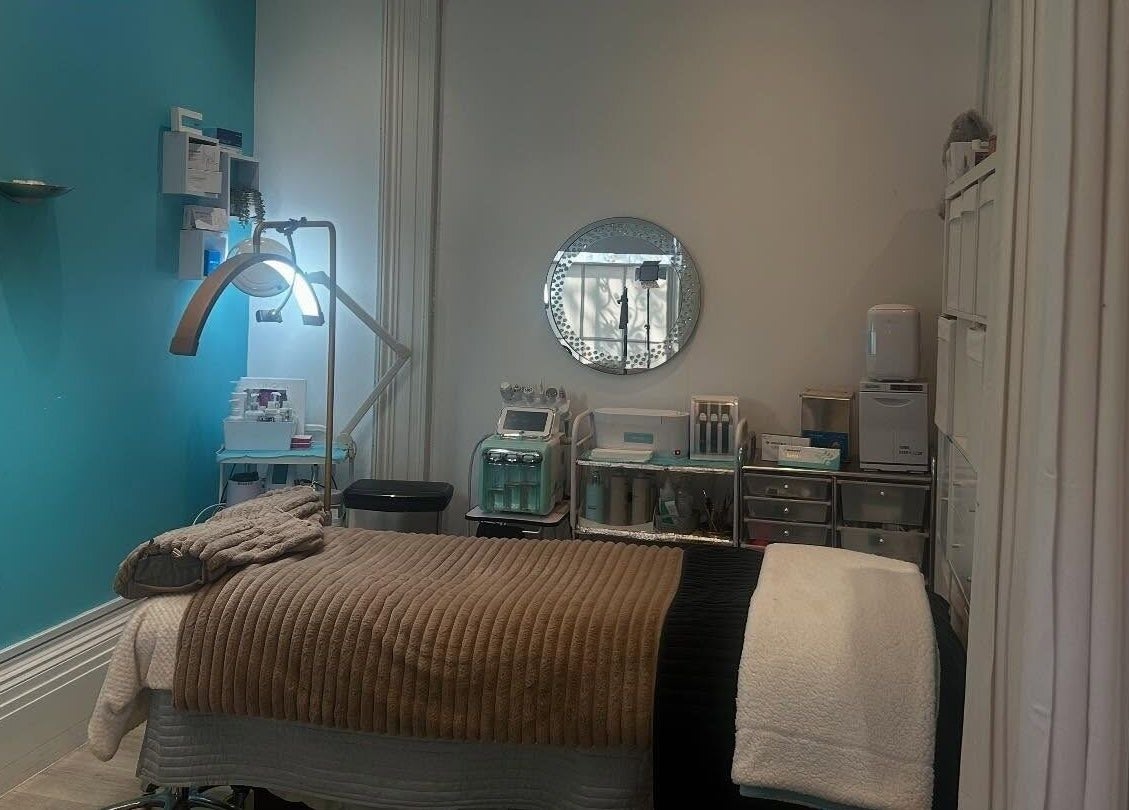 Relaxing treatment room at Hepburns on the Prom in Cheltenham, England, GB, with modern wellness equipment.