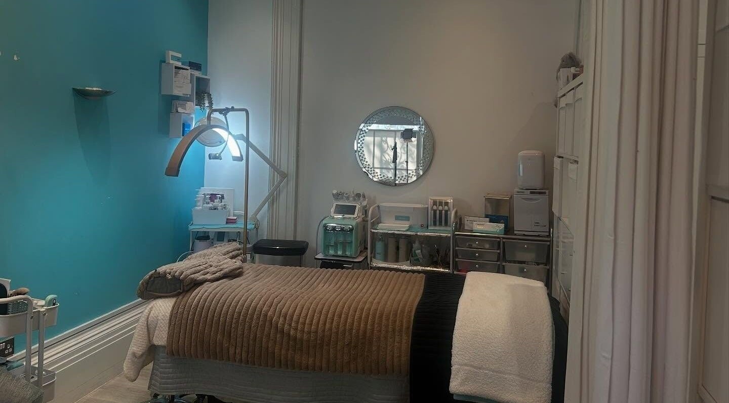 Relaxing treatment room at Hepburns on the Prom in Cheltenham, England, GB, with modern wellness equipment.