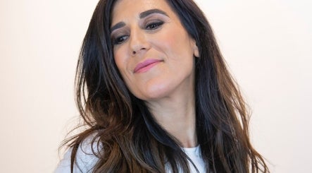 Elegant woman in Windsor at Leo & Simon, showcasing natural beauty and style.