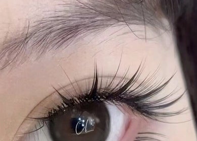 Close-up of elegant lash extensions at iLashes by CL, Singapore, SG, showcasing expert craftsmanship.