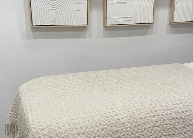 Cozy treatment room at The Lash Cove, Meridan Plains, Queensland, AU showcasing minimalist decor.