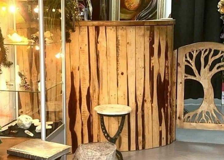 Cozy wooden reception at Studio Gaia London, located in London, England, GB, blending warmth and natural aesthetics.