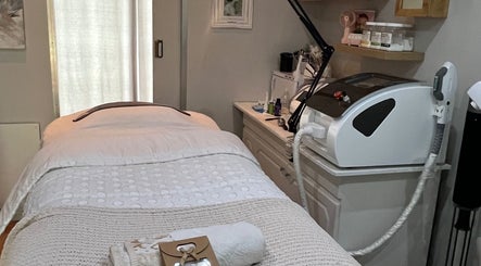 Relaxing treatment room at The Skin Spot in Cape Town, Western Cape, ZA, featuring a cozy bed and equipment.