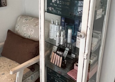 Chic skincare display at The Skin Spot, Cape Town, Western Cape, ZA, featuring elegant cosmetic products.