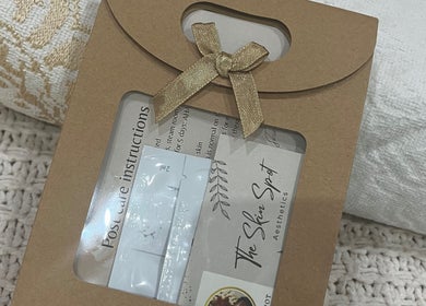 Elegantly packaged gift box from The Skin Spot, Cape Town, Western Cape, ZA, showcasing luxury skincare.
