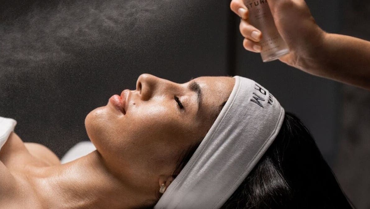 Facial misting treatment at The Skin Spot, Cape Town, Western Cape, ZA. Relaxing spa experience depicted.
